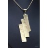 Collier et pendentif martelé en laiton
