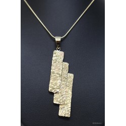 Collier et pendentif martelé en laiton